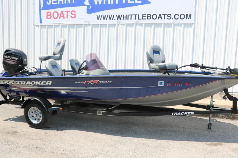 Slide: The Image of 2014 Bass Tracker PT175TF boat on trailer, displayed at Jerry Whittle Boats dealership. - 24