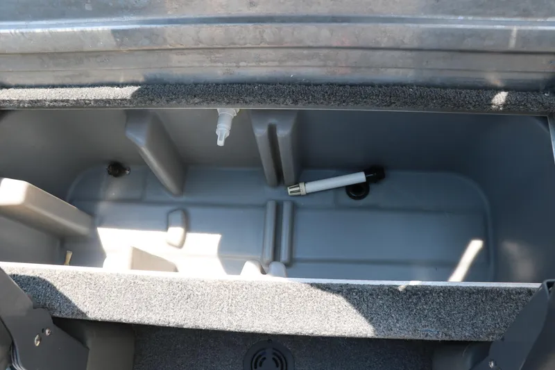 Slide: The Image of Open storage compartment of 2014 Bass Tracker PT175TF boat. - 27