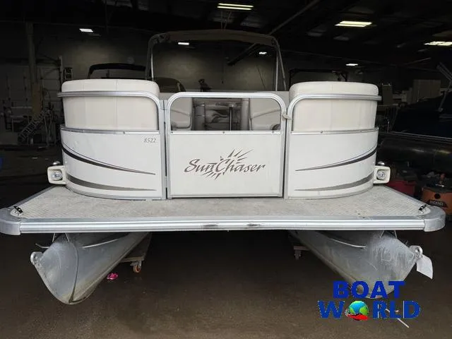 Slide: The Image of 2008 SunChaser 8522 pontoon boat in a warehouse, front view. - 36