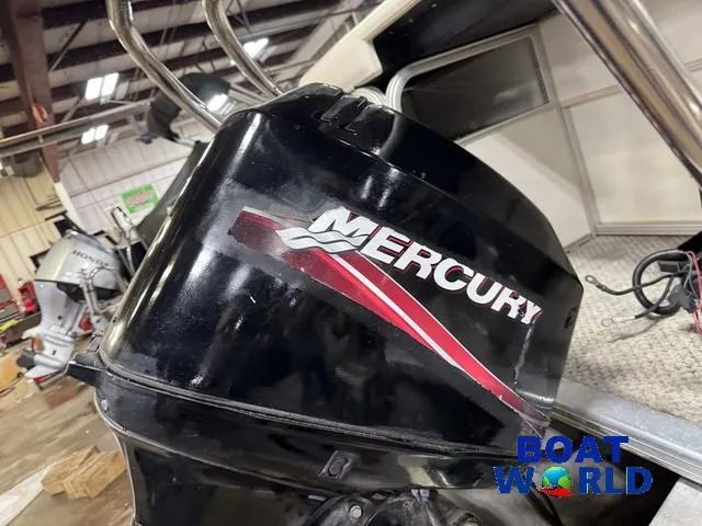 Slide: The Image of 2008 SunChaser 8522 with Mercury outboard motor in a boat showroom. - 39