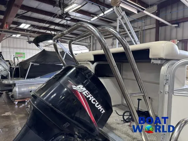 Slide: The Image of 2008 SunChaser 8522 boat with Mercury engine in indoor storage at Boat World. - 41