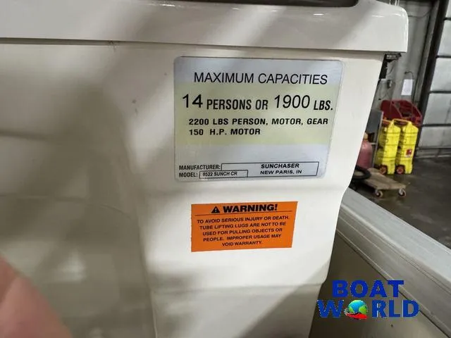 Slide: The Image of Alt text: "SunChaser 8522 boat capacity label, 14 persons or 1900 lbs, 150 HP motor, 2008 model." - 42