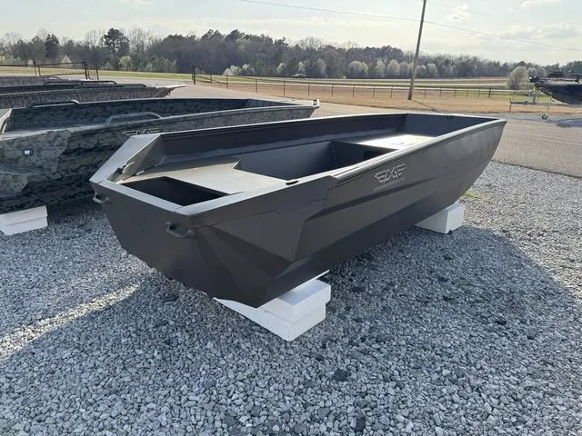 Slide: The Image of 2025 Edge Duck Boats 550 SPORTSMAN on display, gray finish, outdoor setting. - 2