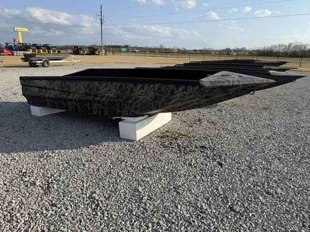 Slide: The Image of 2025 Edge Duck Boats 550 SPORTSMAN on gravel lot, showcasing sleek design and camouflage pattern. - 6