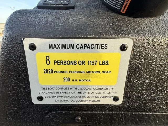 Slide: The Image of 2022 Excel Boats Bay Pro 220 capacity plate: 8 persons, 1157 lbs, 200 HP motor. - 10