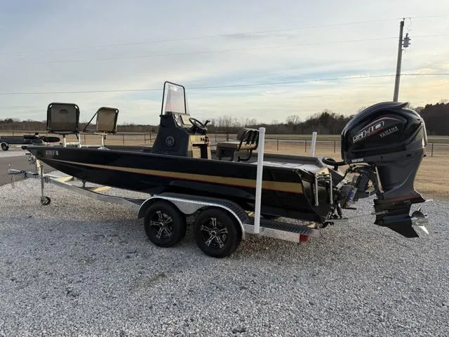 Slide: The Image of 2022 Excel Boats Bay Pro 220 on trailer with Yamaha outboard motor. - 3