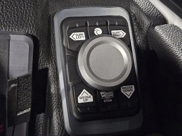 Slide: The Image of Control panel of 2025 Malibu 23 LSV boat with surf and wedge adjustments. - 44