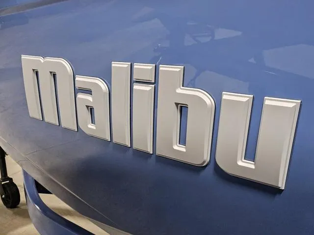 Slide: The Image of Close-up of 2025 Malibu 23 LSV logo on blue surface. - 5