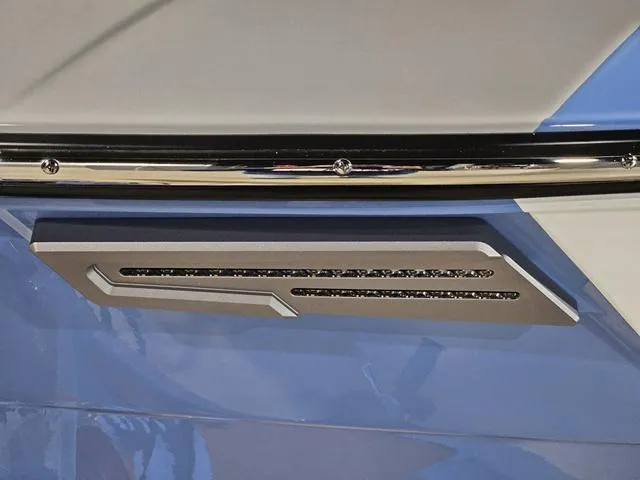 Slide: The Image of 2025 Malibu 23 LSV boat detail with sleek design and modern trim. - 8