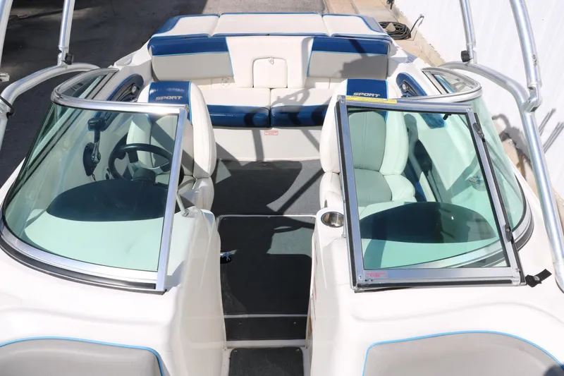 Slide: The Image of Dashboard of a 2011 Sea Ray 205 Sport boat with steering wheel and gauges. - 20