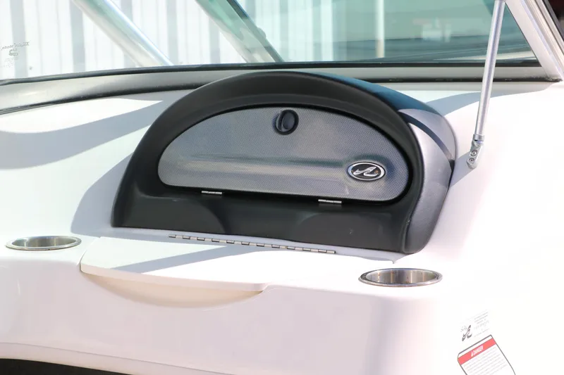 Slide: The Image of Dashboard of a 2011 Sea Ray 205 Sport boat with steering wheel and gauges. - 28