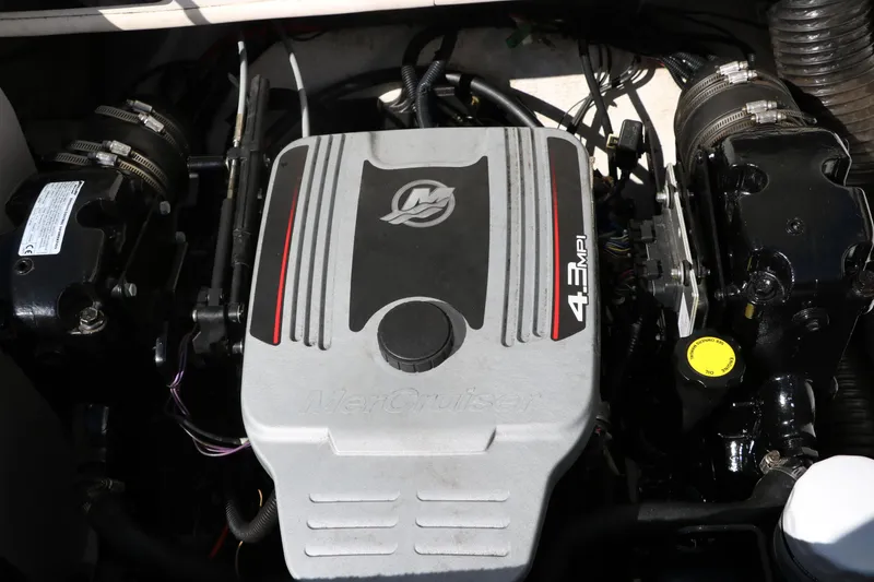 Slide: The Image of 2011 Sea Ray 205 Sport engine, featuring a 4.3 MPI motor. - 31