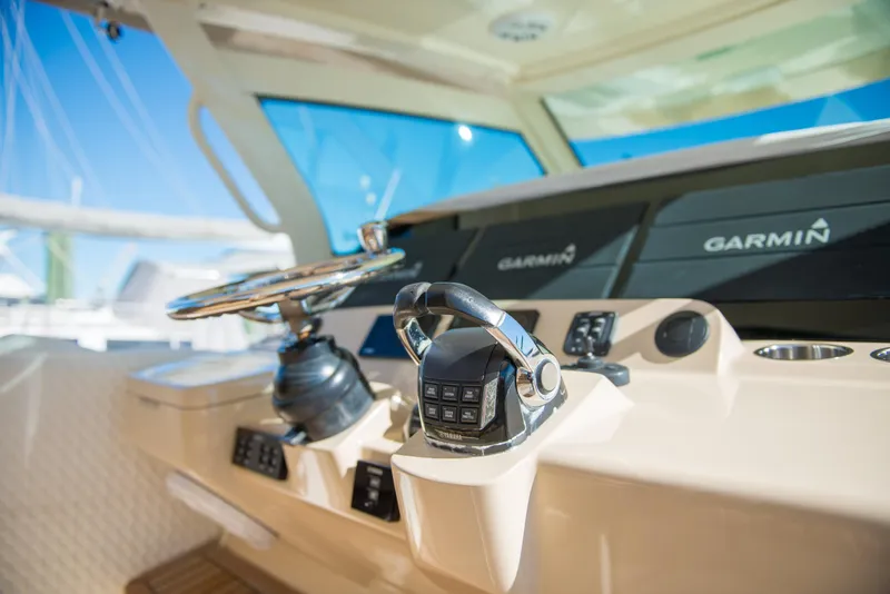 Slide: The Image of 2017 Scout 420 LXF boat helm with Garmin navigation system. - 32
