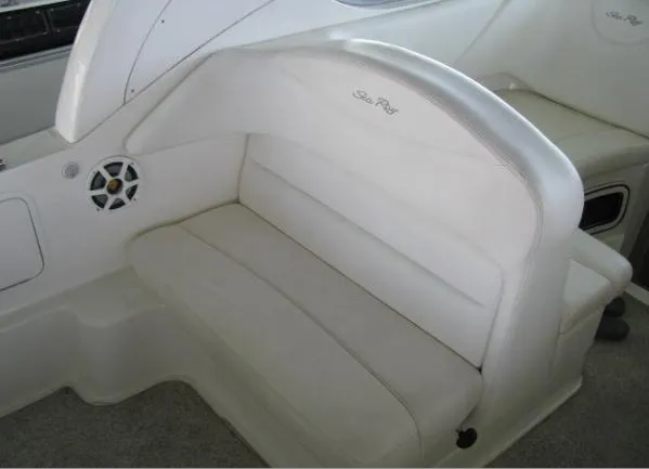 Slide: The Image of 2005 Sea Ray 280 Sundancer helm with steering wheel and control panel. - 4