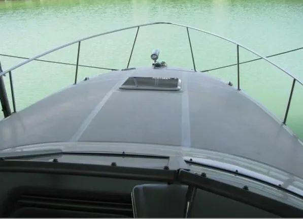 Slide: The Image of 2005 Sea Ray 280 Sundancer boat interior with helm and seating area. - 7