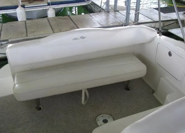 Slide: The Image of 2005 Sea Ray 280 Sundancer boat sink with faucet and cup holders. - 9