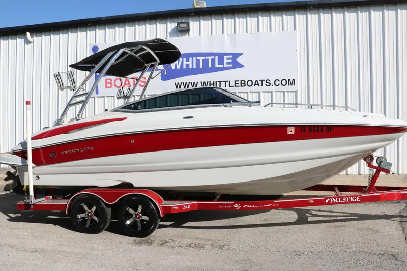 Slide: The Image of 2007 Crownline 240 EX boat on trailer at Whittle Boats dealership. - 13