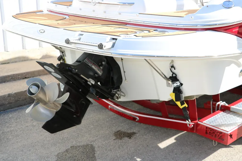 Slide: The Image of 2007 Crownline 240 EX boat stern with propeller and trailer. - 5