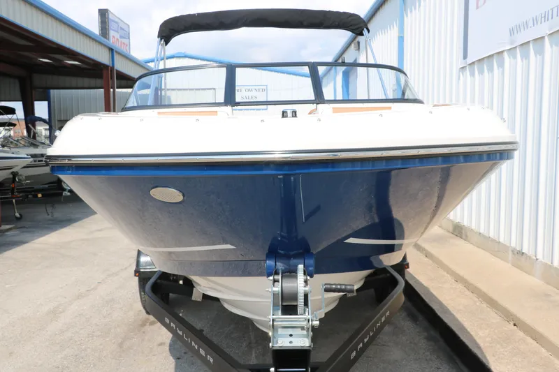 Slide: The Image of 2020 Bayliner VR5 Bowrider I/O boat on trailer, front view, blue and white design. - 11