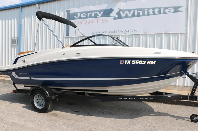 Slide: The Image of 2020 Bayliner VR5 Bowrider I/O boat on trailer at dealership. - 14