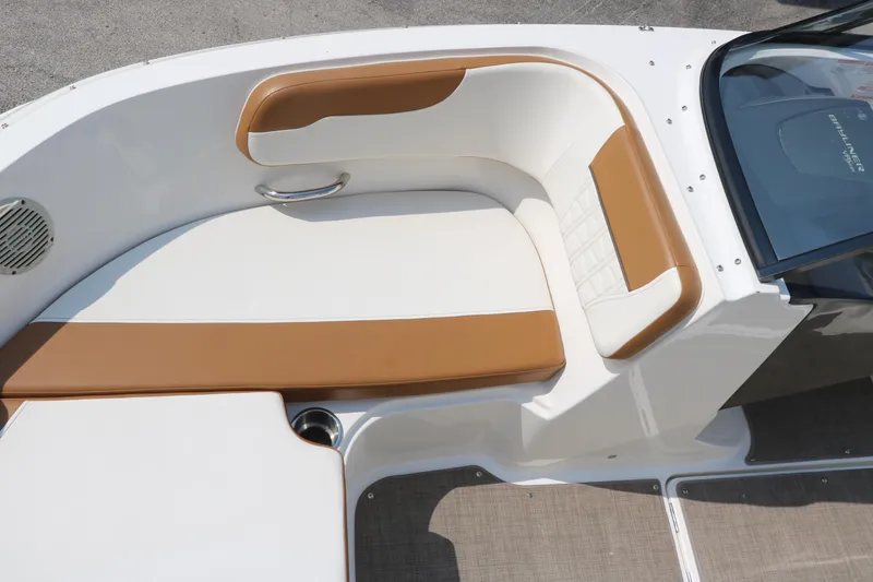 Slide: The Image of 2020 Bayliner VR5 Bowrider I/O boat interior with tan and white seating. - 26