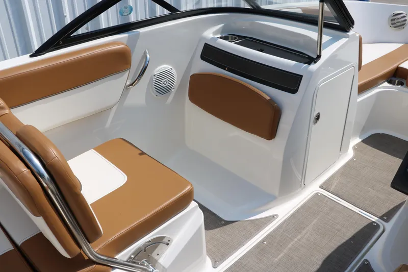 Slide: The Image of 2020 Bayliner VR5 Bowrider I/O interior with tan and white seating. - 30