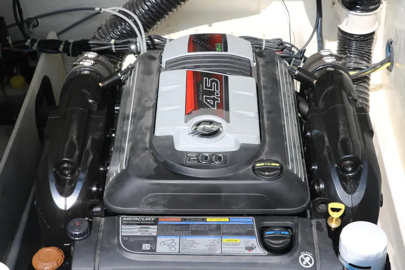 Slide: The Image of 2020 Bayliner VR5 Bowrider I/O engine, featuring a 4.5L Mercury 200 horsepower motor. - 31