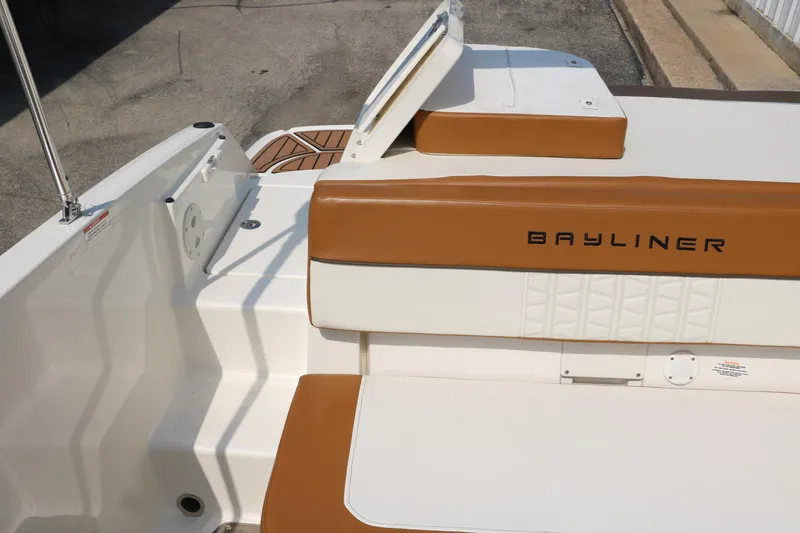 Slide: The Image of 2020 Bayliner VR5 Bowrider I/O boat interior with tan and white seating. - 34