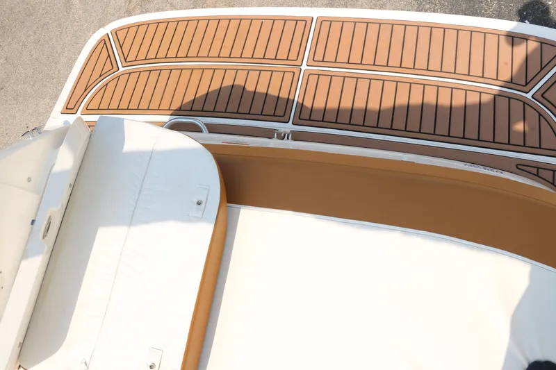 Slide: The Image of 2020 Bayliner VR5 Bowrider I/O boat deck with brown and white seating. - 35