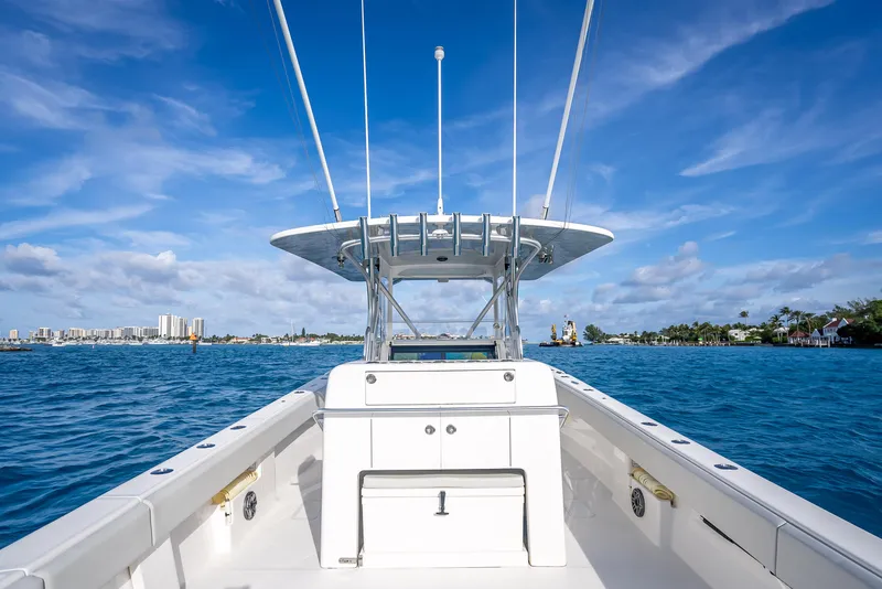 Slide: The Image of 2024 SeaVee 390B boat on blue water under clear sky. - 14