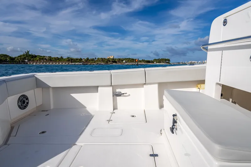 Slide: The Image of 2024 SeaVee 390B boat deck with ocean view and clear blue sky. - 29