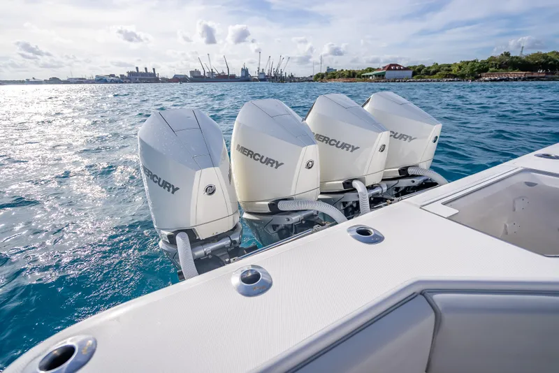 Slide: The Image of 2024 SeaVee 390B boat with four Mercury outboard engines on the water. - 41