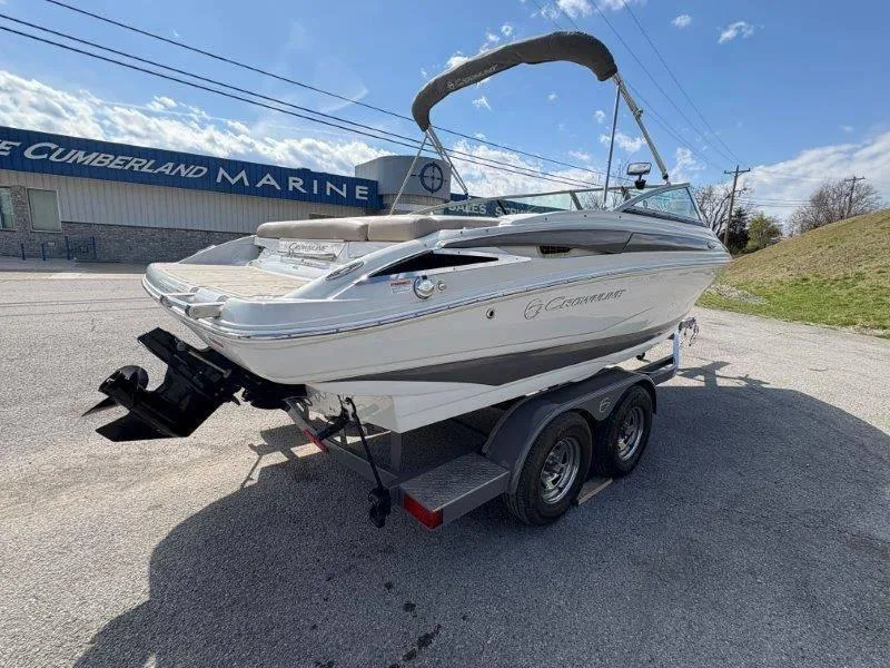 Slide: The Image of 2019 Crownline 215 SS boat on trailer at Cumberland Marine dealership. - 17