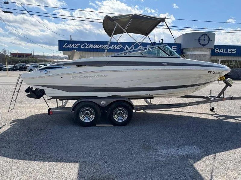 Slide: The Image of 2019 Crownline 215 SS boat on trailer at Lake Cumberland Marine sales. - 20