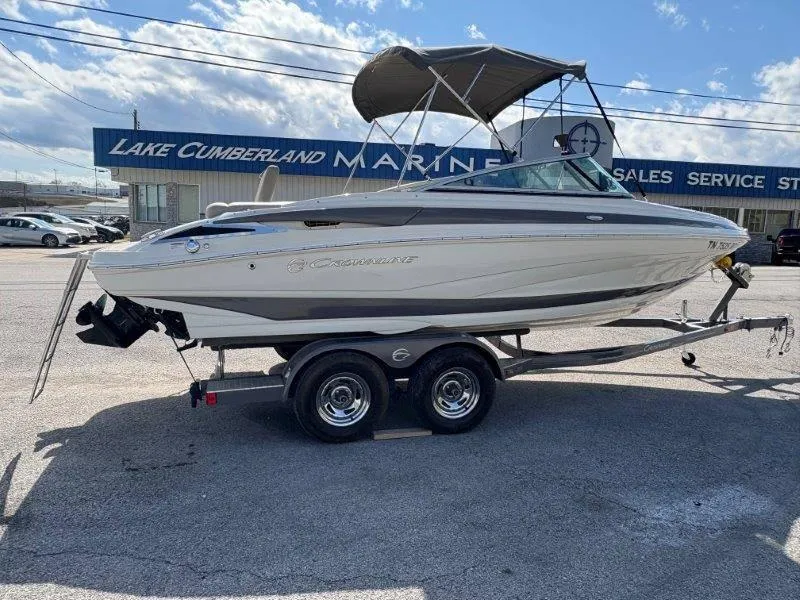 Slide: The Image of 2019 Crownline 215 SS boat on trailer at Lake Cumberland Marine dealership. - 24