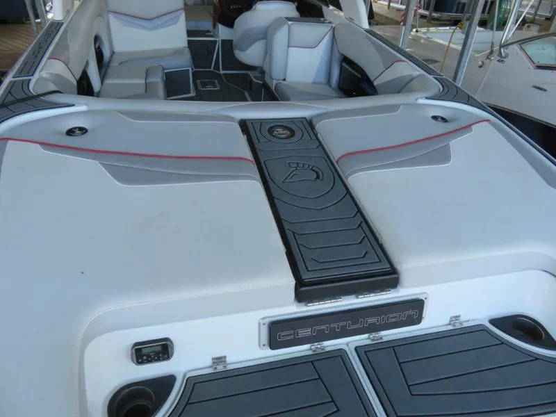Slide: The Image of 2017 Centurion Ri237 boat interior with sleek seating and modern design. - 4