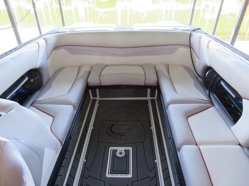 Slide: The Image of 2017 Centurion Ri237 boat interior with spacious seating and sleek design. - 6