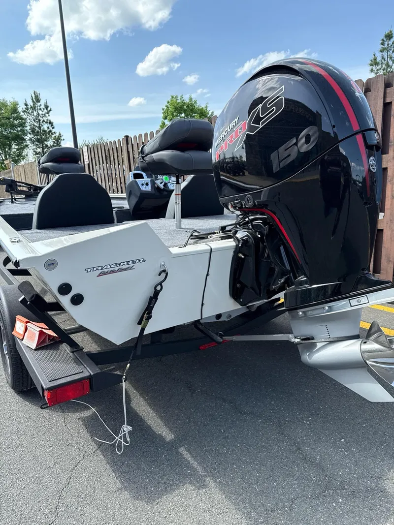 Slide: The Image of 2025 Tracker Pro Team 195 Tournament Edition boat with powerful 150 HP engine. - 3