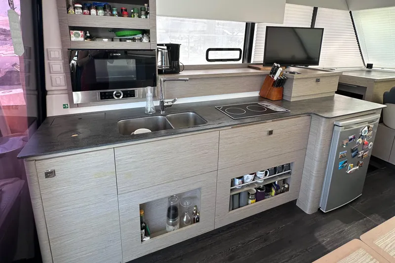 Slide: The Image of Interior view of 2021 Fountaine Pajot MY4.S yacht skylight, showcasing modern design. - 13