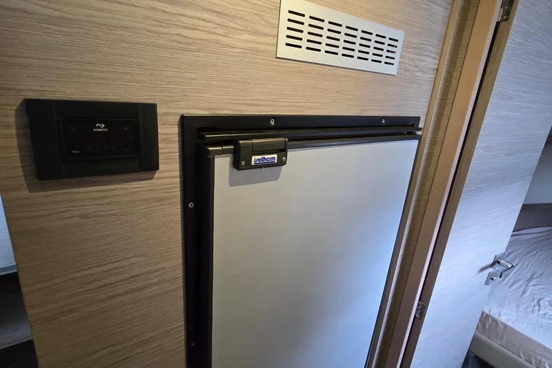 Slide: The Image of Modern kitchen interior of 2021 Fountaine Pajot MY4.S yacht with appliances and sleek design. - 15