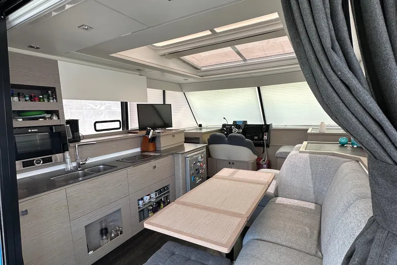 Slide: The Image of Modern bedroom interior of 2021 Fountaine Pajot MY4.S yacht, featuring sleek design and natural light. - 3