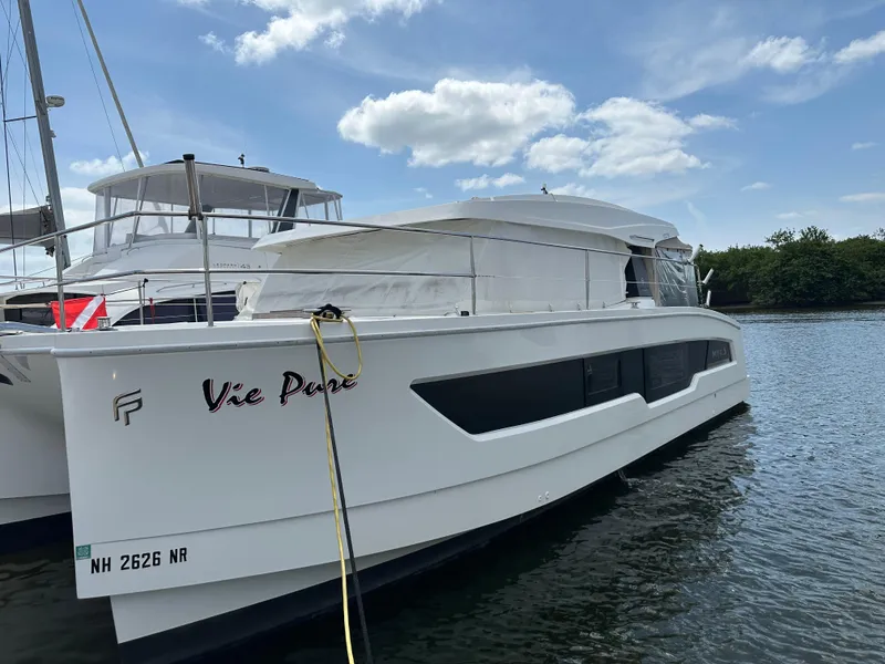 Slide: The Image of Engine compartment of a 2021 Fountaine Pajot MY4.S motor yacht, showcasing mechanical components. - 45