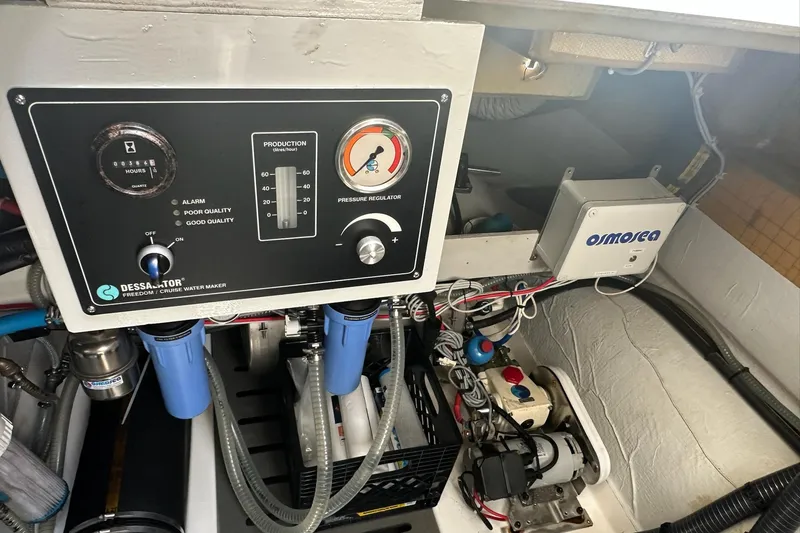 Slide: The Image of Engine room of 2021 Fountaine Pajot MY4.S with water maker and control panel. - 50