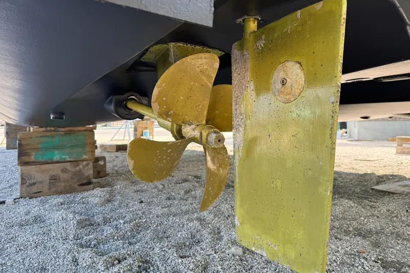 Slide: The Image of Propeller and rudder of 2021 Fountaine Pajot MY4.S catamaran on dry dock. - 55