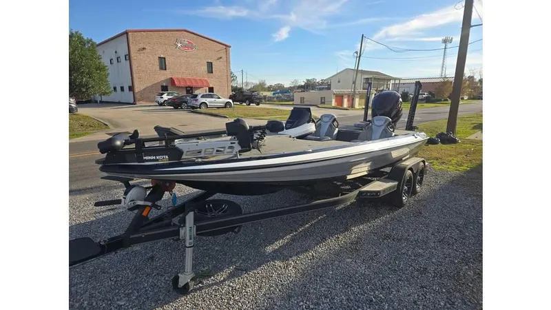 Slide: The Image of 2022 Skeeter ZXR20 boat on trailer in parking lot, sunny day. - 3