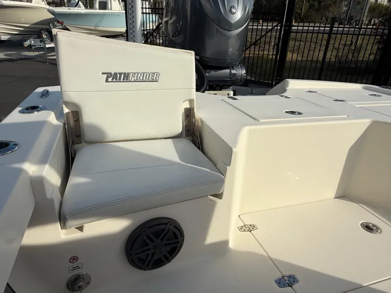 Slide: The Image of 2022 Pathfinder 2500 Hybrid boat seat with logo, featuring a sleek design and speaker. - 15