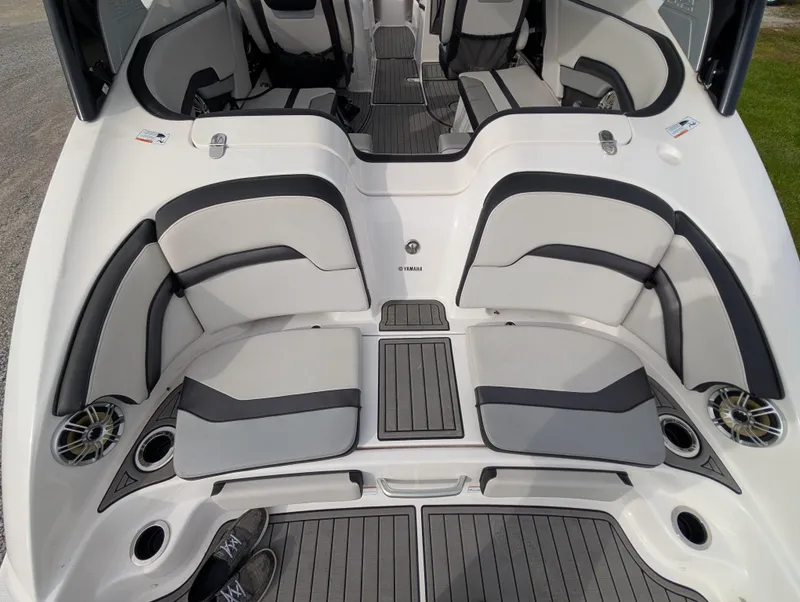 Slide: The Image of 2017 Yamaha Boats 242X E-Series interior with sleek seating and modern design. - 11