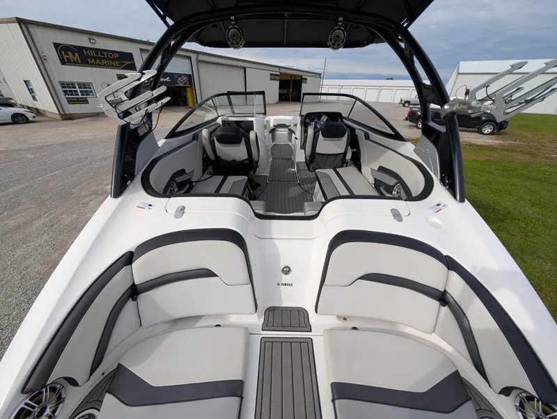 Slide: The Image of 2017 Yamaha Boats 242X E-Series interior with sleek seating and modern design. - 12