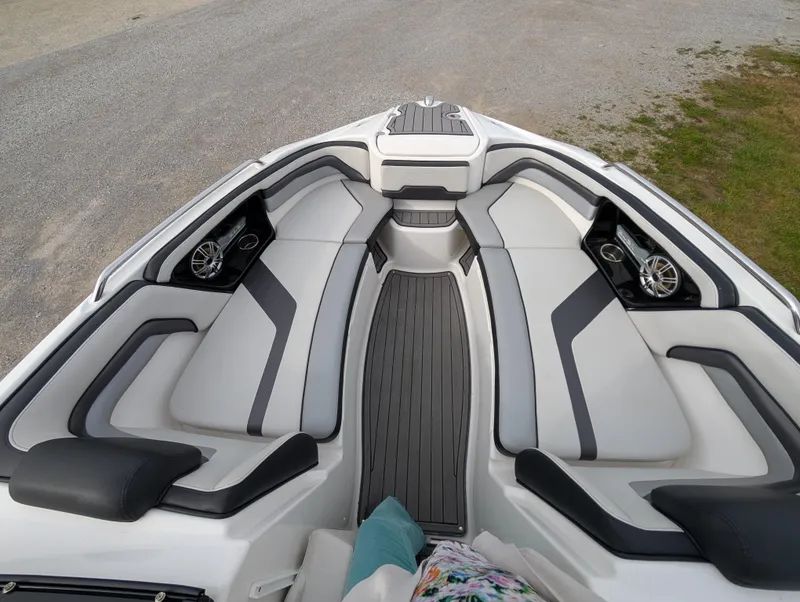 Slide: The Image of 2017 Yamaha Boats 242X E-Series interior with sleek seating and modern design. - 18