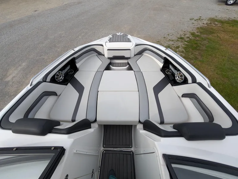 Slide: The Image of 2017 Yamaha Boats 242X E-Series interior with sleek seating and modern design. - 23